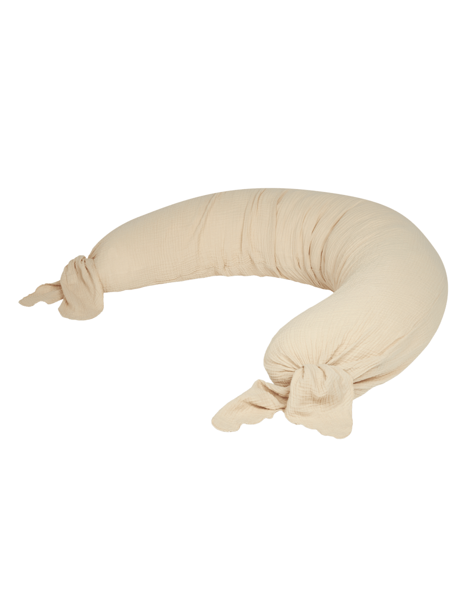 Nobodinoz Maternity Pillow Wabi-Sabi - Ginger, crescent-shaped pillow on a plain background
