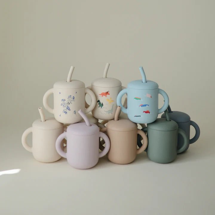 Mushie - Baby Tableware - Silicone Training Cup + Straw - Dinosaurs - Tummy Time
