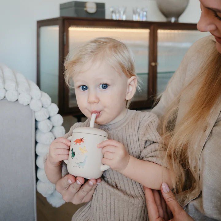 Mushie - Baby Tableware - Silicone Training Cup + Straw - Dinosaurs - Tummy Time