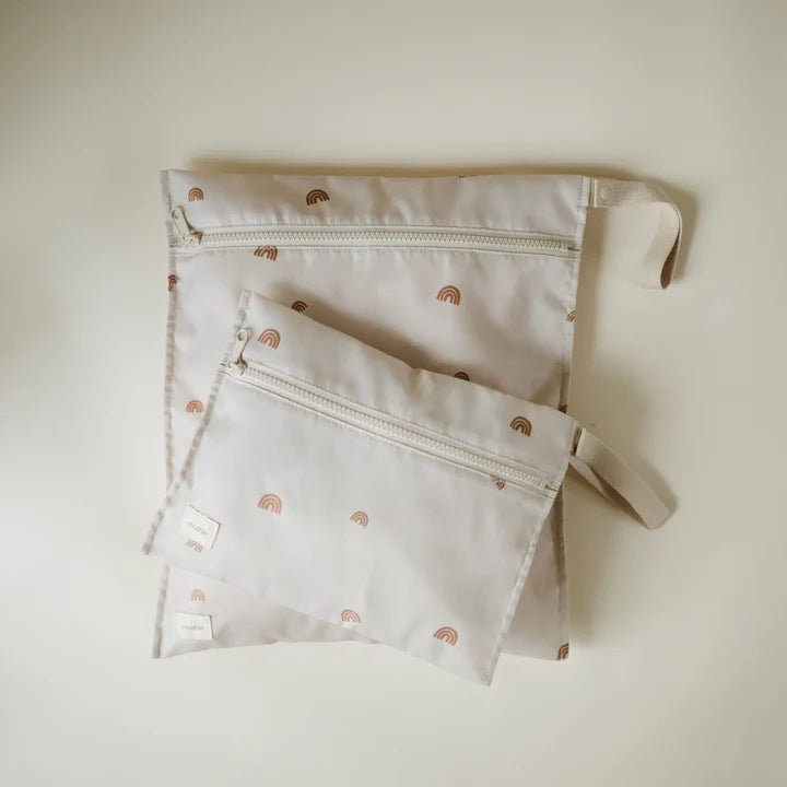 Mushie - Nursery & Diaper Bags - Water Resistant Wet Bag - Rainbows - Tummy Time