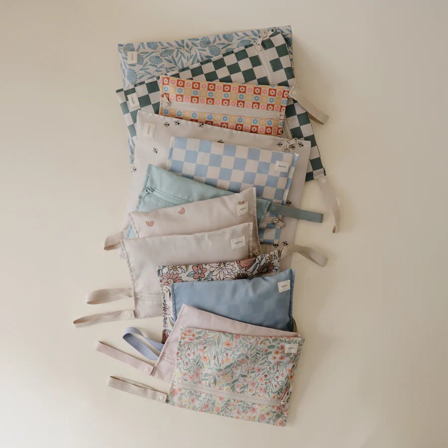 Mushie - Nursery & Diaper Bags - Water Resistant Wet Bag - Rainbows - Tummy Time