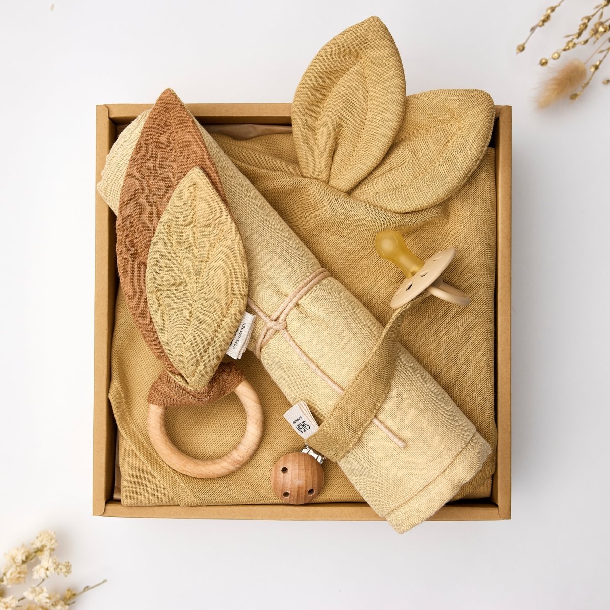 saga copenhagen baby gift box bumblebee, open box styled with dried flowers