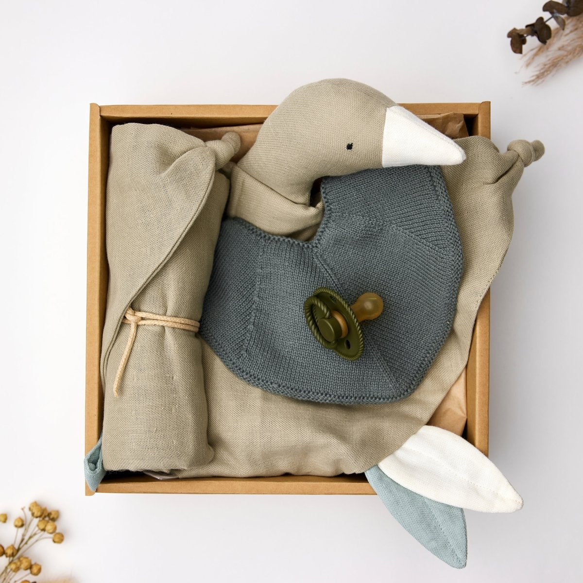 saga copenhagen baby gift box green tea, open box styled with dried flowers