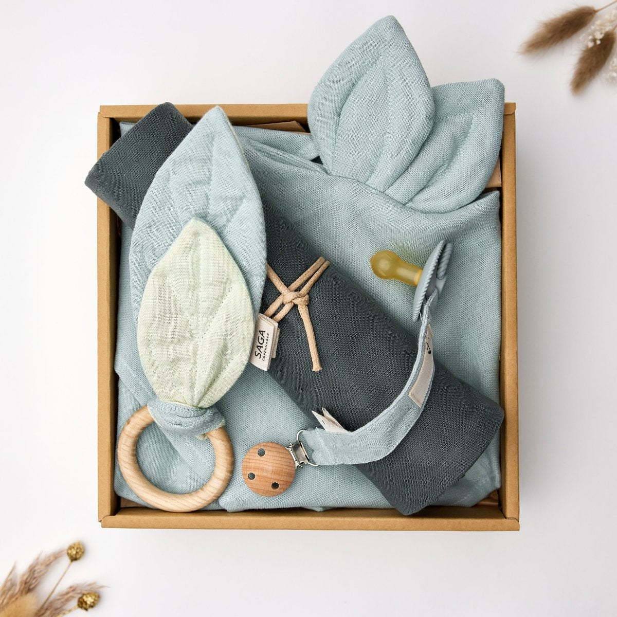 saga copenhagen baby gift box morning mist, open box styled with dried flowers